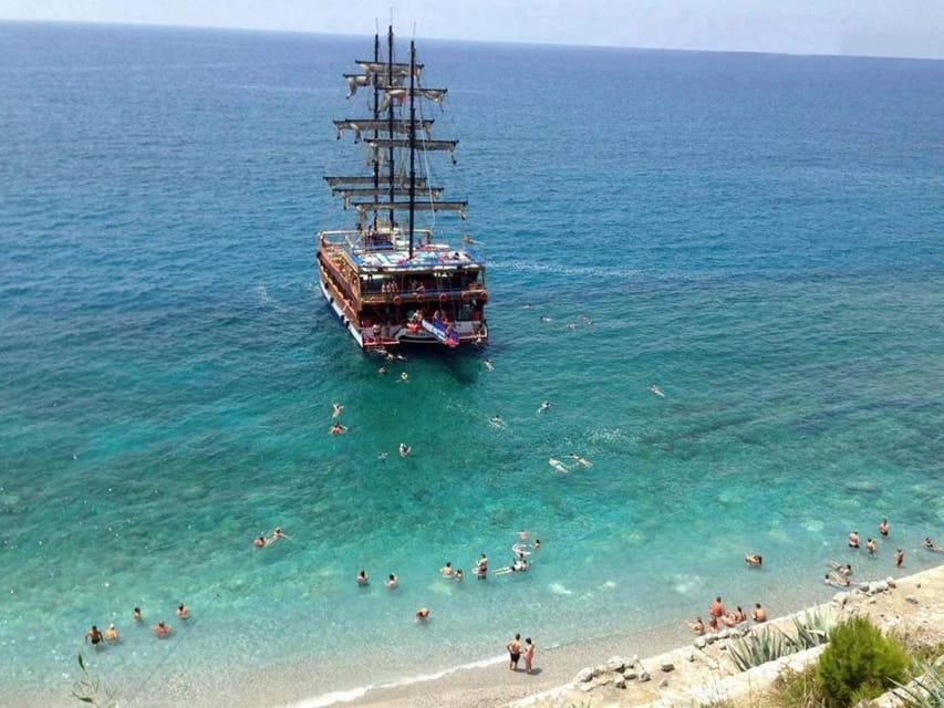 Alanya: Catamaran Boat Tour with Snorkeling and BBQ Lunch - Leaving Alanya Harbor and seeing the city from offshore