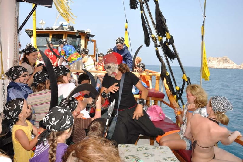 Alanya: Pirate Boat Trip with Meal, Drinks and Pickup Option - Swimming at the first coastal stop
