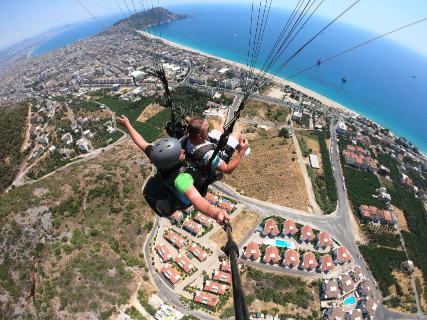 Alanya: Tandem Paragliding from 700m with Meeting or Pick Up - Getting back after the beach landing