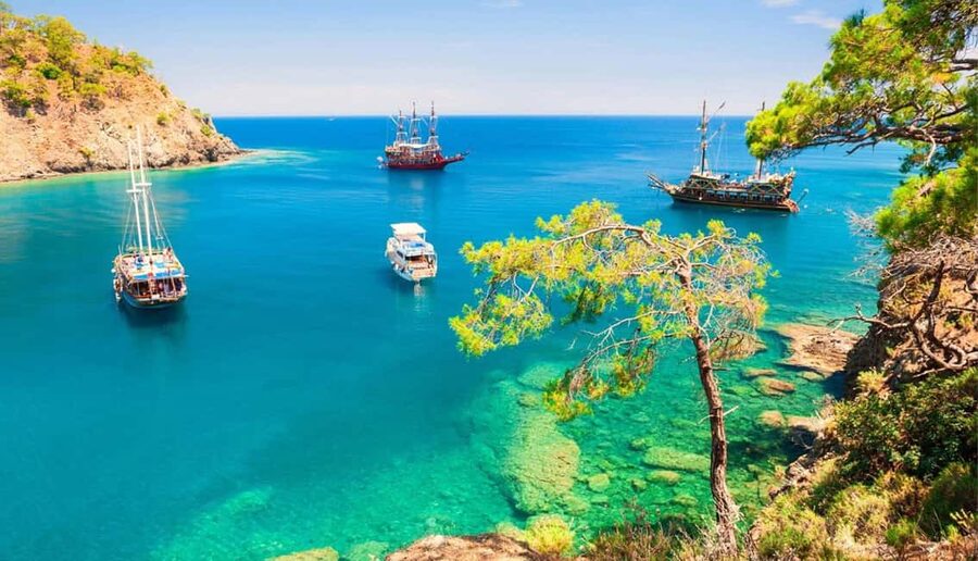 Antalya & Kemer: Pirate Boat Tour With Foam Party & Swimming - Cennet and Aquarium Coves: swimming in clear water