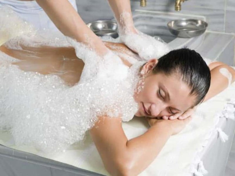 Bodrum: Turkish Bath with Oil Massage and Hotel Pickup - The scrub and foam massage on the marble platform