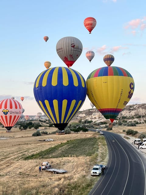 Cappadocia: Goreme Hot Air Balloon Flight Experience - Sunrise above the rocky valleys