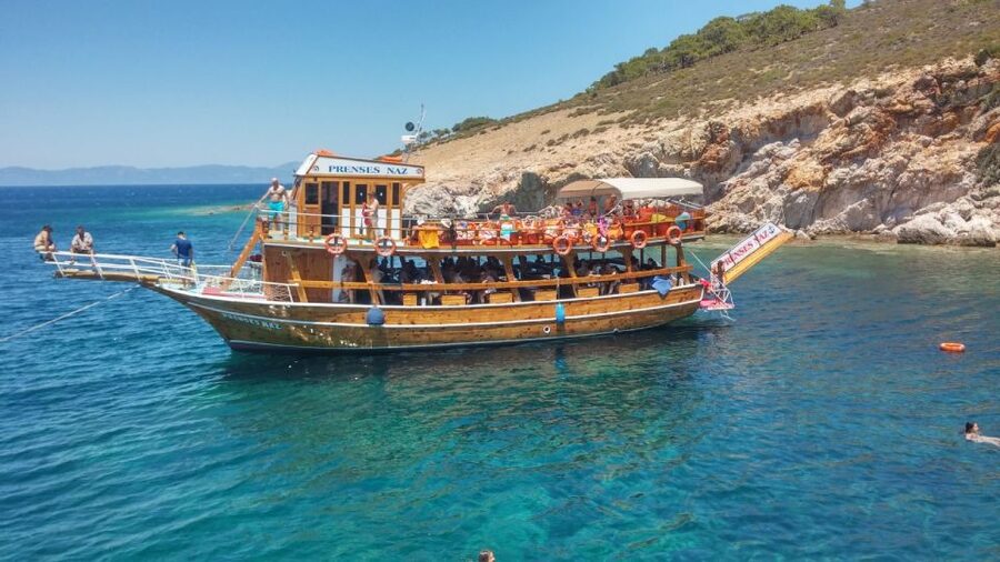 Didim/Altinkum: Lazy Day Boat Trip w/BBQ Lunch - Settling onto the wooden boat