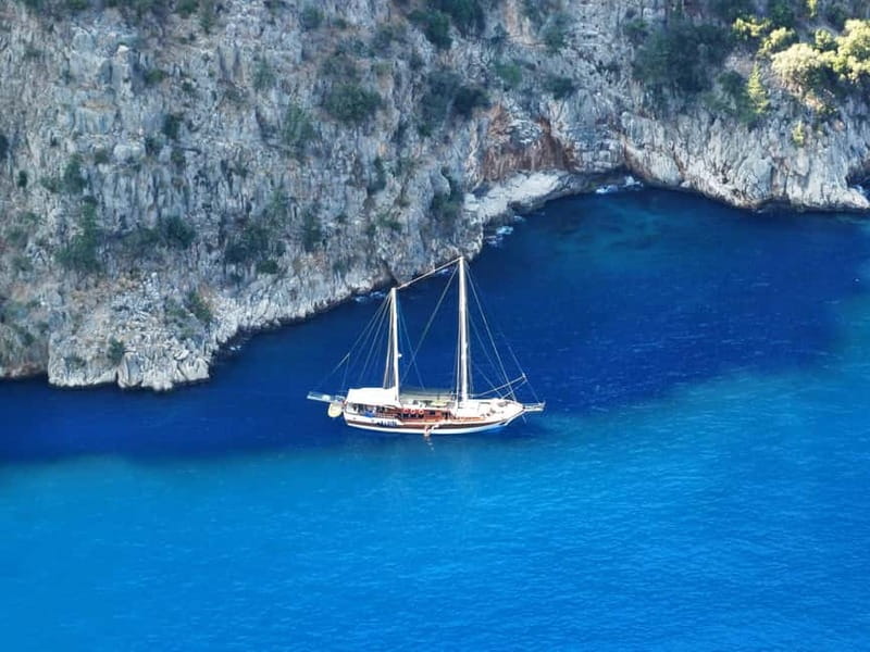 Fethiye: Island Sailing Trip with Lunch and Hotel Pickup - Dockyard Island mixes calm water with ruins