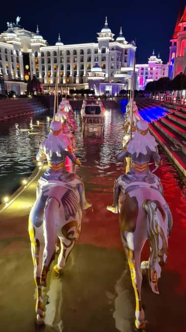 From Alanya: Land of Legends Night Show with Hotel Transfers - The boat parade along the park waterway