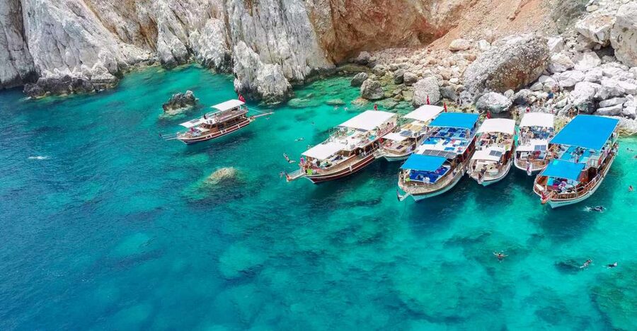 From Antalya or Kemer: Suluada Island Boat Trip with Lunch - Boarding the wooden boat at Adrasan