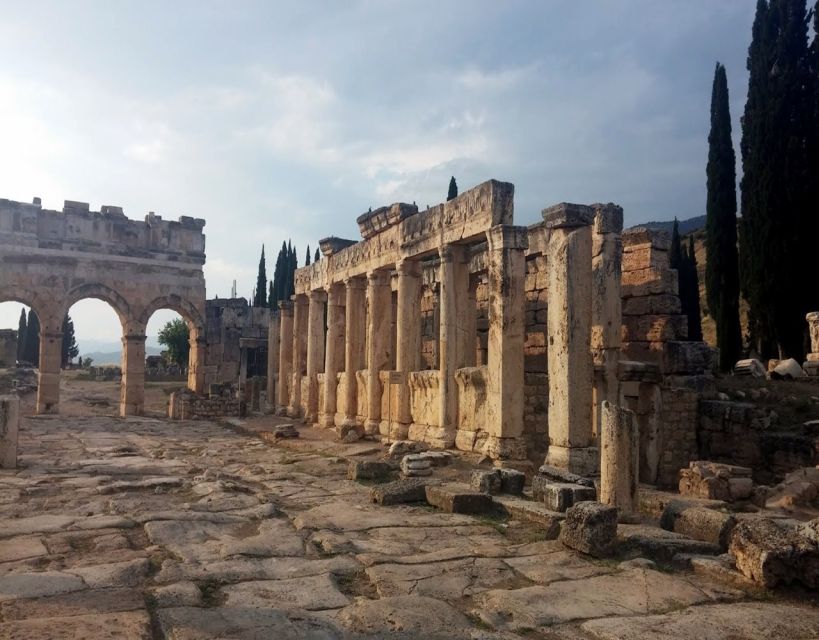 From Fethiye: Pamukkale & Hierapolis Day Trip w/ Meals - Walking through Hierapolis above the terraces