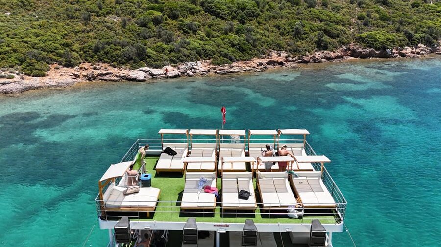 From Izmir: Full Day Boat Trip around Cesme with BBQ Lunch - Finding your place aboard the Poseidon boat