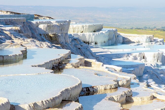 Full-day Pamukkale and Hierapolis Tour from Selcuk or Kusadasi - Walking into Hierapolis above Pamukkale