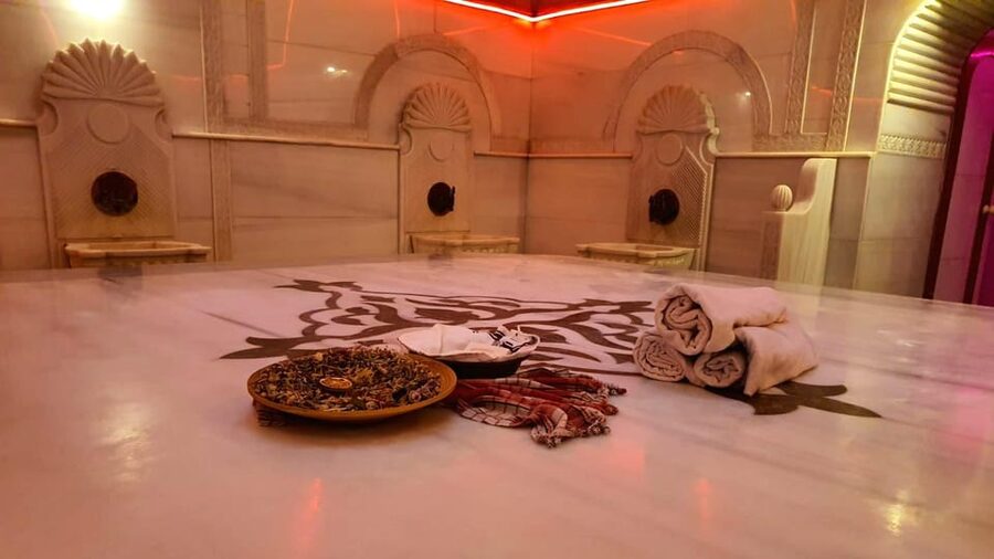 Istanbul: Acemoglu Historical Turkish Bath w/Private Options - The clay mask starts the treatment