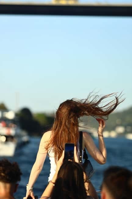 Istanbul: Bosphorus Private Guided Yacht Cruise with Snacks - Returning past Galata Bridge, Galata Tower, and Galataport