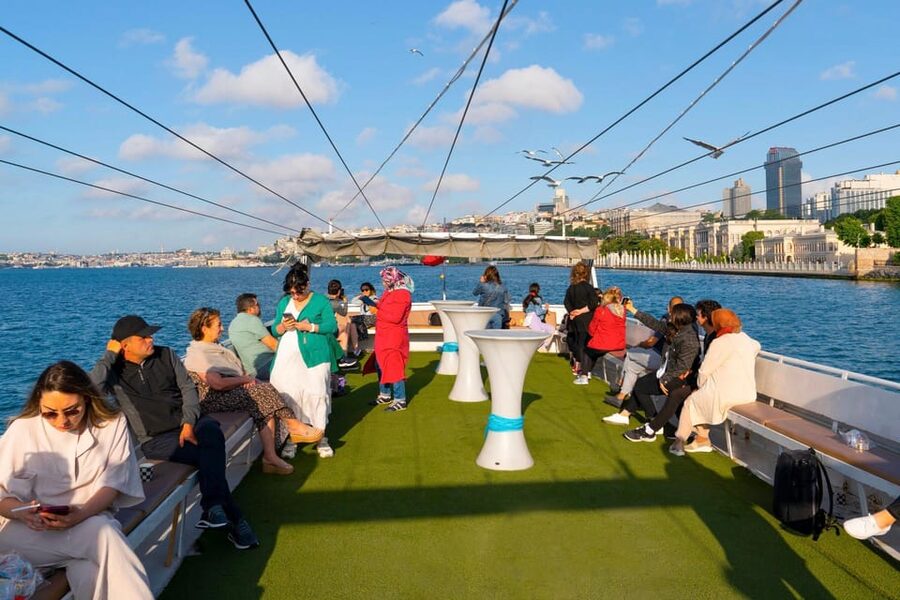 Istanbul: Bosphorus Strait Sightseeing Cruise & Audio Guide - Passing beneath the Bosphorus Bridge