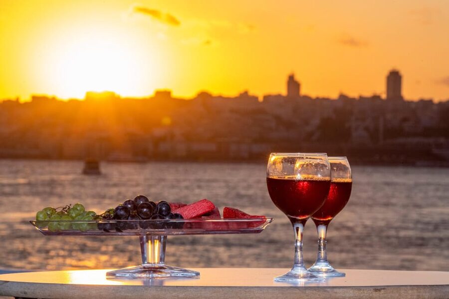 Istanbul: Bosphorus Sunset Cruise with Drinks & Snack - Dolmabahçe Palace and the European shore