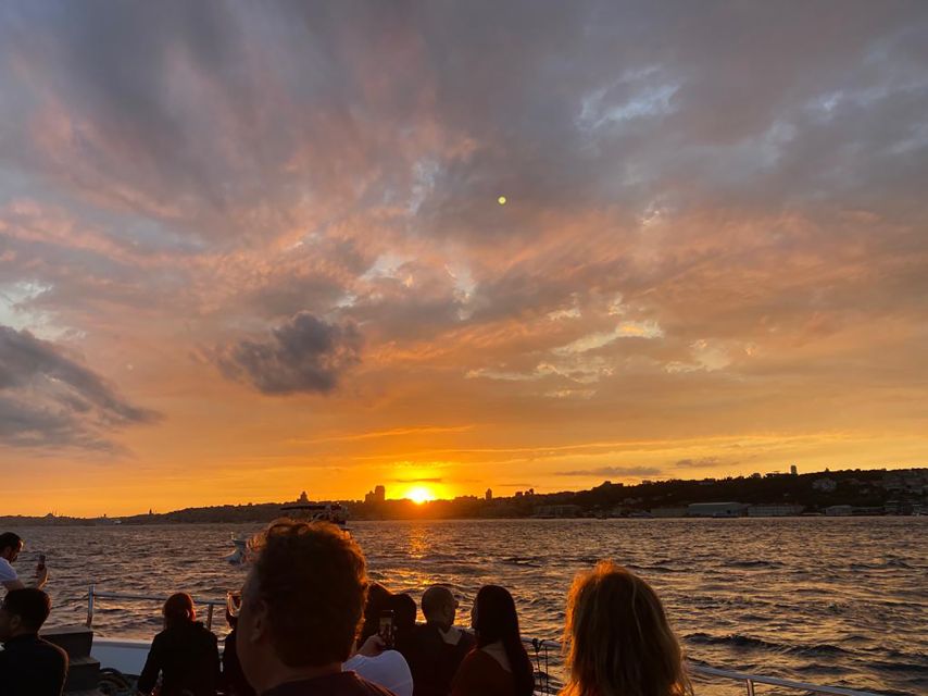 Istanbul: Bosphorus Sunset Cruise with Snacks and Wine - Returning past the bridges to Maiden’s Tower