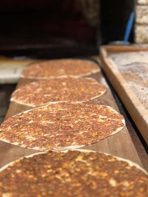 Istanbul: Guided Food Tour with Ferry Ride and Tastings - More market bites before the return ferry