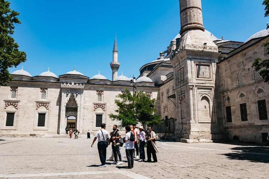 Istanbul: Hagia Sophia, Blue Mosque, Suleymaniye Mosque Tour - A Turkish drink at a historic madrasah