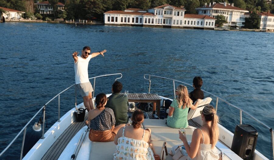 Istanbul: Small Group Yacht Tour with Unlimited Wine - The Bosphorus Bridge and the turn toward Asia