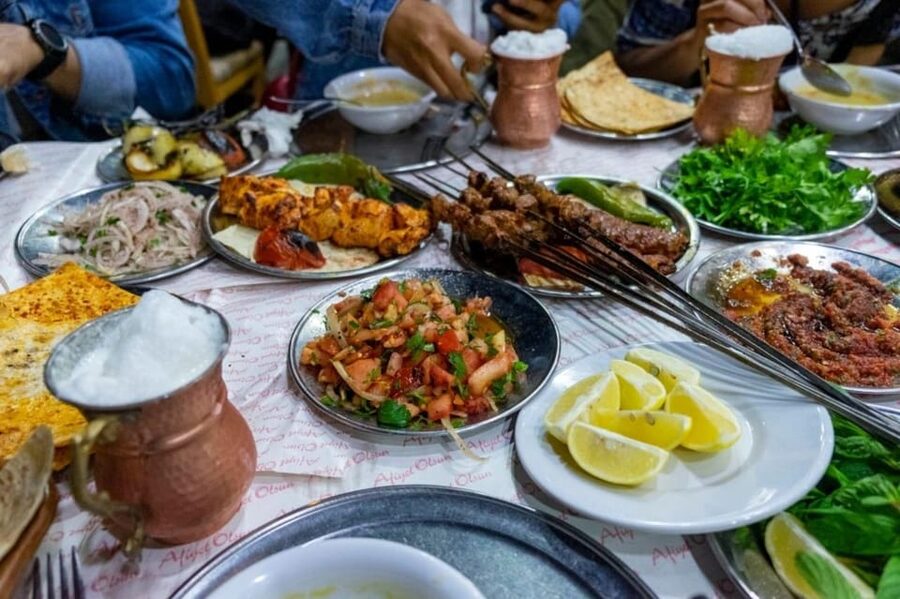Istanbul: Turkish Food Night and Rooftop Experience - Fatih dinner: a Turkish feast with serious portions
