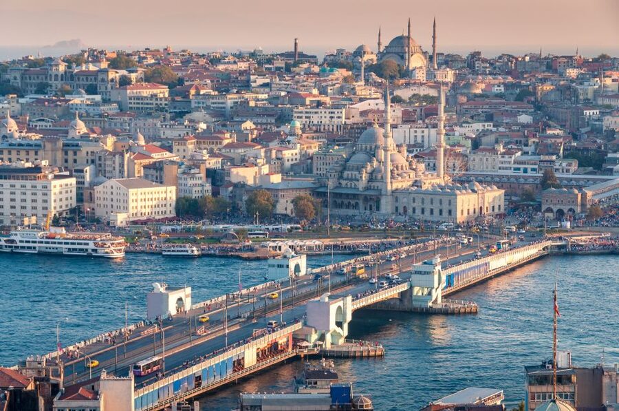 Istanbul: Two Continents Evening Bus Tour with Commentary - Besiktas and Taksim Square in the evening