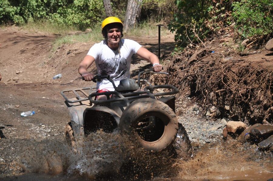 Kemer: Forest, Mud, and Streams Quad Safari Tour with Pickup - Getting started on the quad