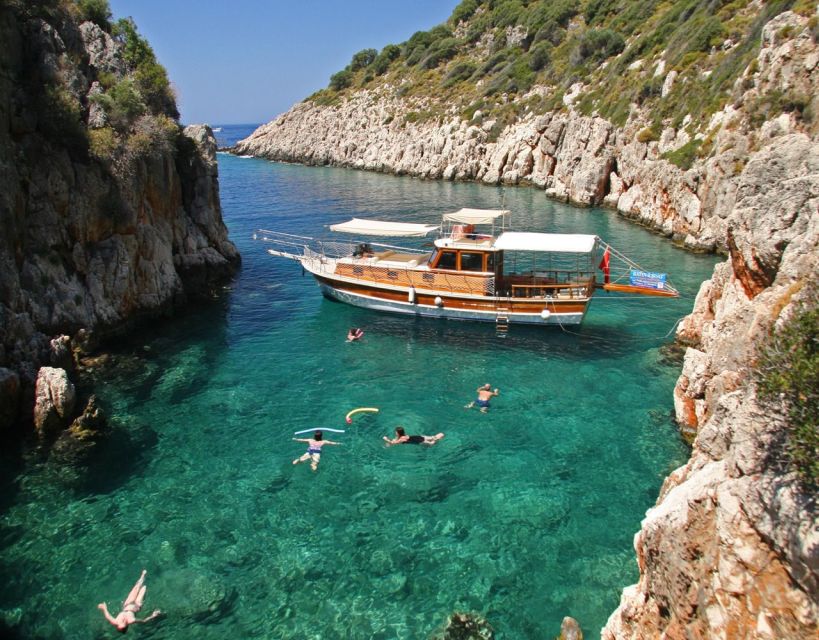 Kusadasi: Full-Day Boat Cruise w/ Lunch & Hotel Pickup - Settling onto the boat in Kusadasi