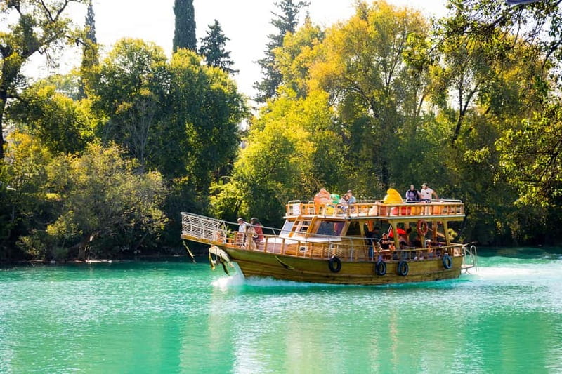 Side: Manavgat River Boat Trip & Grand Market w/ Lunch - Cruising the Manavgat River on a wooden boat