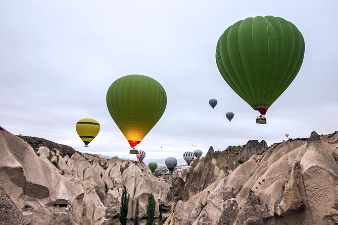 Sunrise Hot Air Balloon Flight Over Göreme & Fairy Chimneys - Watching the balloons prepare for launch